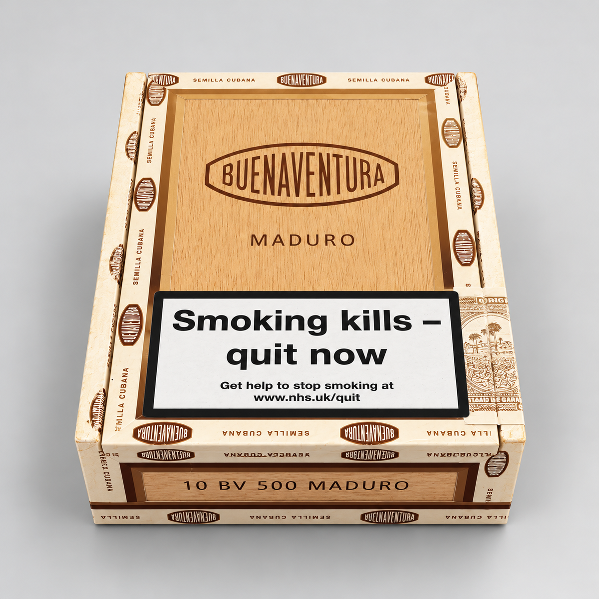 A box of Buenaventura Maduro cigarillos, featuring a light wood-grain style front panel with the brand name and a prominent black and white health warning label. The box is shown on a neutral light gray background.