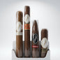 Four Davidoff cigars in a white plastic display stand against a light gray studio background. The cigars are wrapped in brown paper with white, red, and black labels, including visible text such as Anniversary, Yamasa, and Maduro.