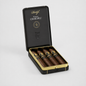 An open black cigar tin with gold trim holding five cigars, photographed on a clean light gray studio background. The inside lid shows the brand name Davidoff and the text Western Churchill.