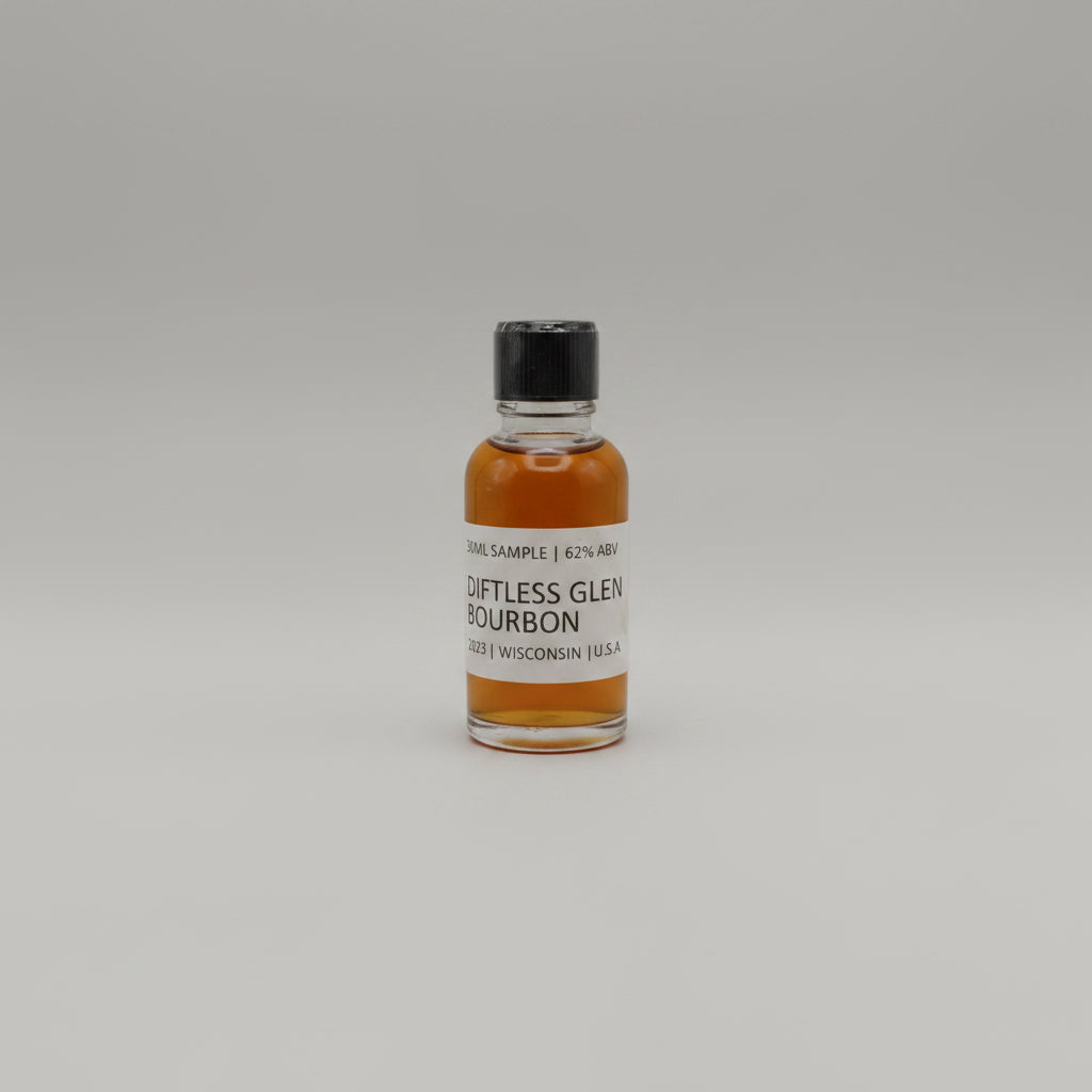 Bottle of Diftless Glen Bourbon on a black background