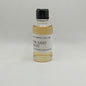Small bottle of Don Julio Anejo on a gray background