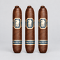 Three brown cigars standing upright against a light gray background, each with a blue and gold label featuring a white lion emblem and the word MADURO.