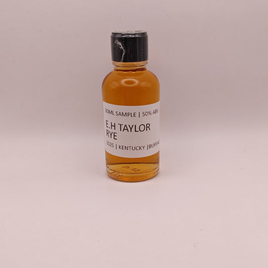 Small bottle of E.H. Taylor Rye on a beige background