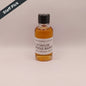 Bottle of E.H. Taylor Single Barrel whiskey on a beige background