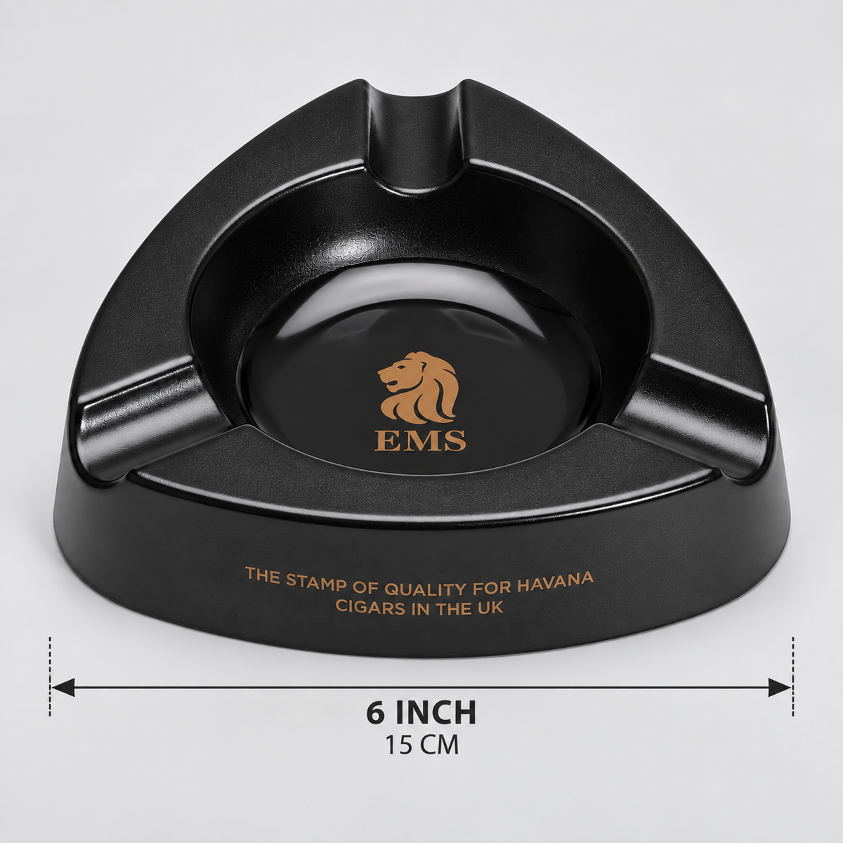 Black triangular cigar ashtray with gold EMS lion logo and text, shown on a light gray background with a 6-inch (15 cm) width measurement overlay.