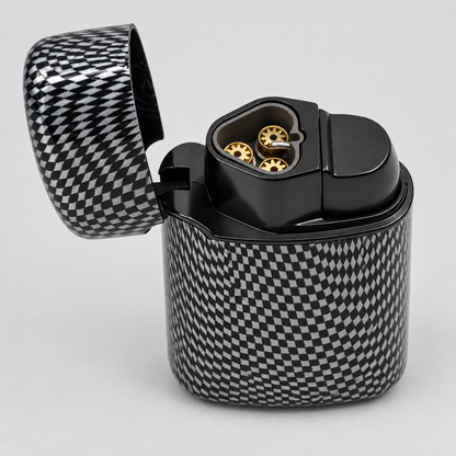 A black and white checkered carbon fiber lighter shown open, revealing gold-toned ignition components inside, set against a neutral light gray background.