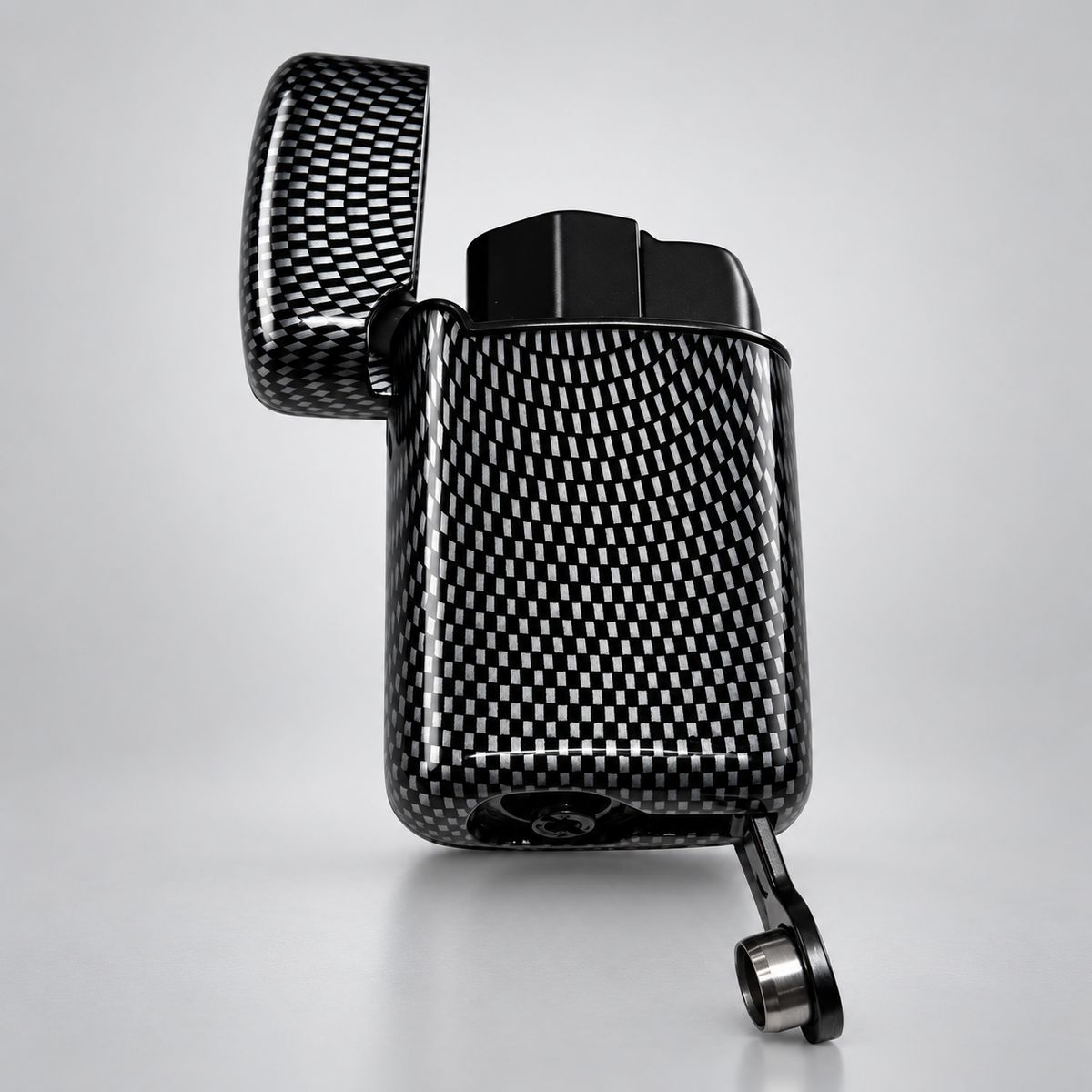 A carbon fiber patterned lighter with its lid open, showing a glossy black and white woven texture, set against a clean light gray background.