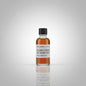 Bottle of Elijah Craig 18 Year Old bourbon on a reflective surface with blurred background