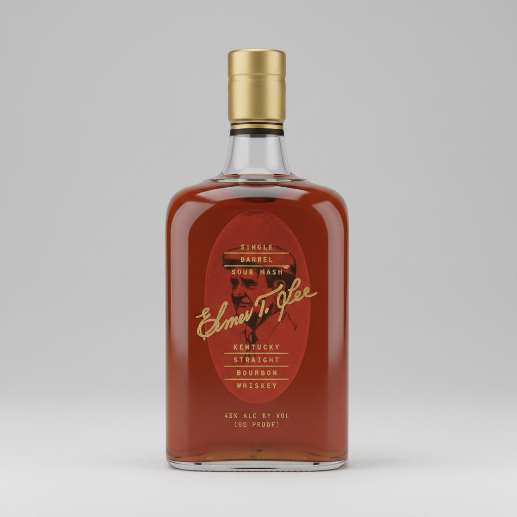 A bottle of Elmer T. Lee Bourbon Whiskey with amber liquid, a gold cap, and a dark brown label on a white background.