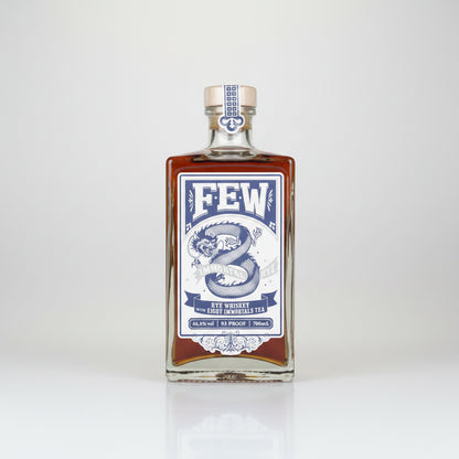 Bottle of Few Rye Whiskey with a blue and white label on a white background