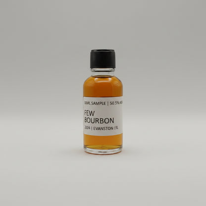 Small bottle of FEW bourbon on a white background