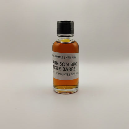 Small bottle of Garrison Bros Single Barrel whiskey on a white surface