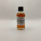 Small bottle of Garrison Bros Single Barrel whiskey on a white surface