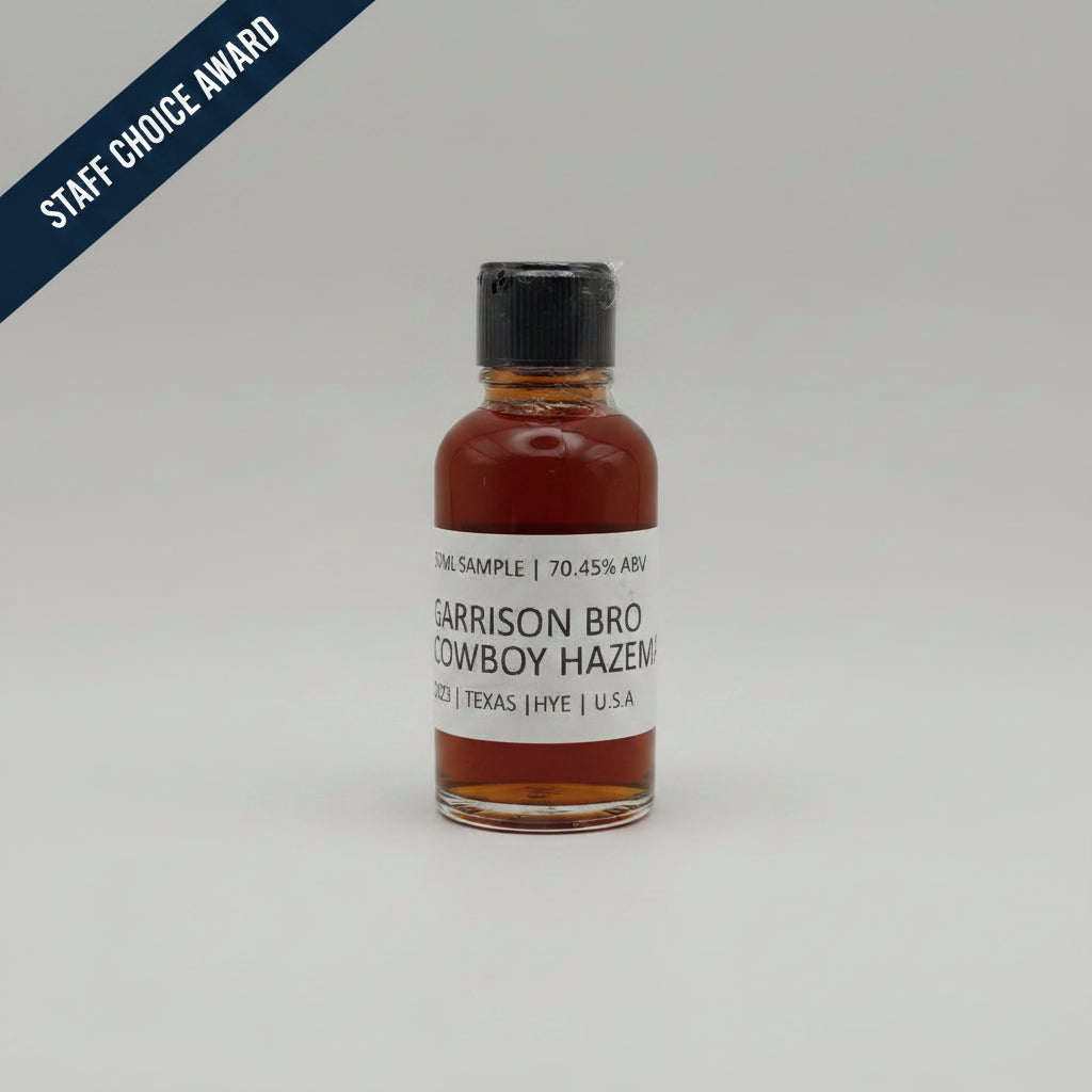 Bottle of Garrison Brothers Cowboy Hazemat Whiskey on a white background