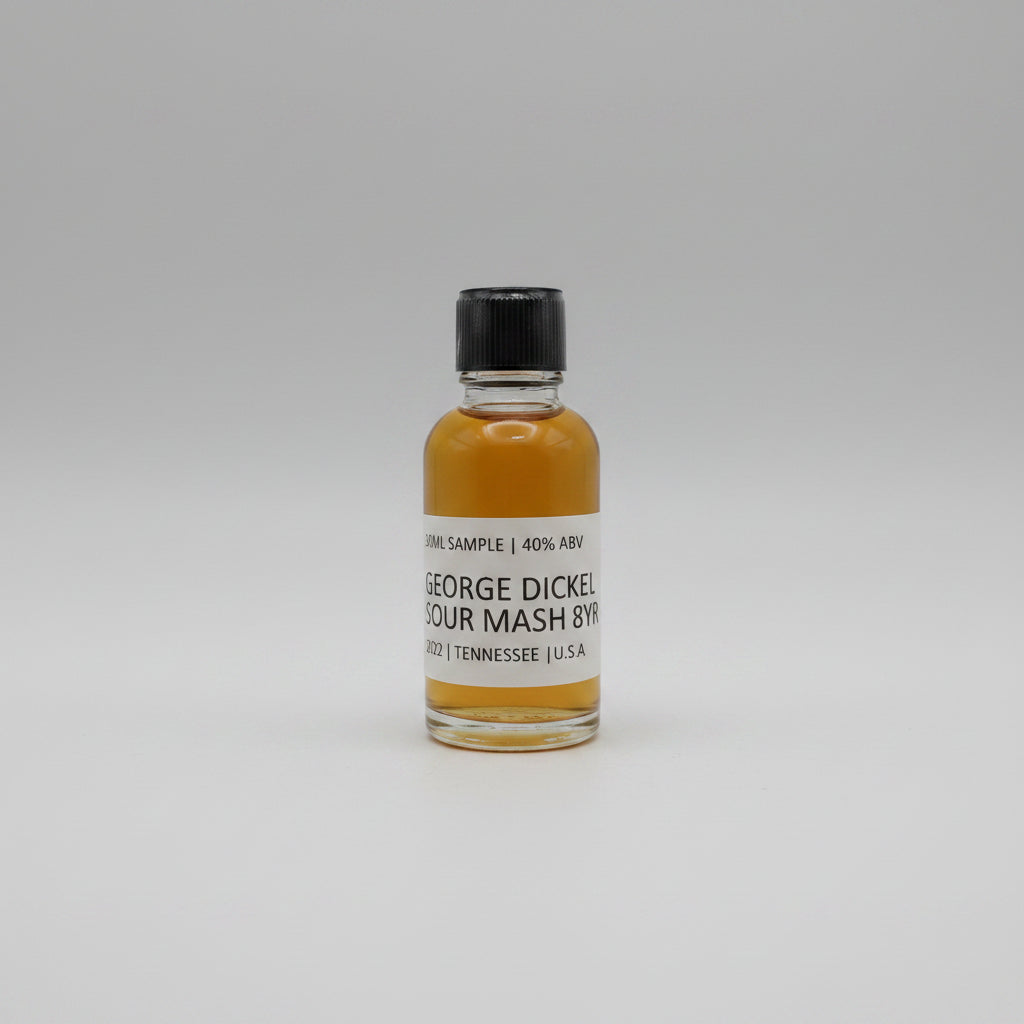 Small bottle of George Dickel Rye Whiskey sample on a white background