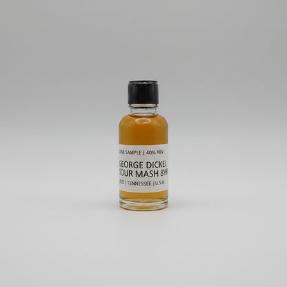 Small bottle of George Dickel Rye Whiskey sample on a white background
