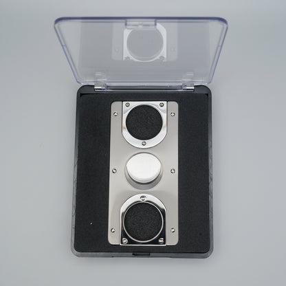 Close up of boxed two tone cigar cutter
