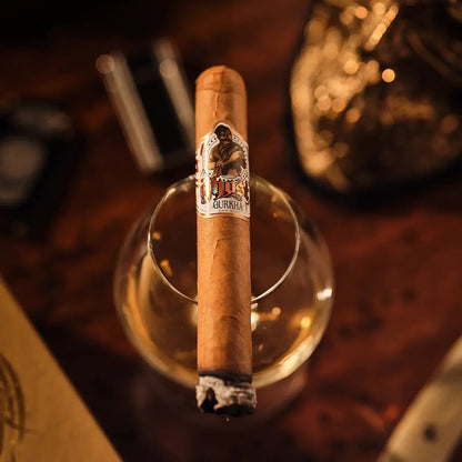 Cigar on a glass with a blurred background