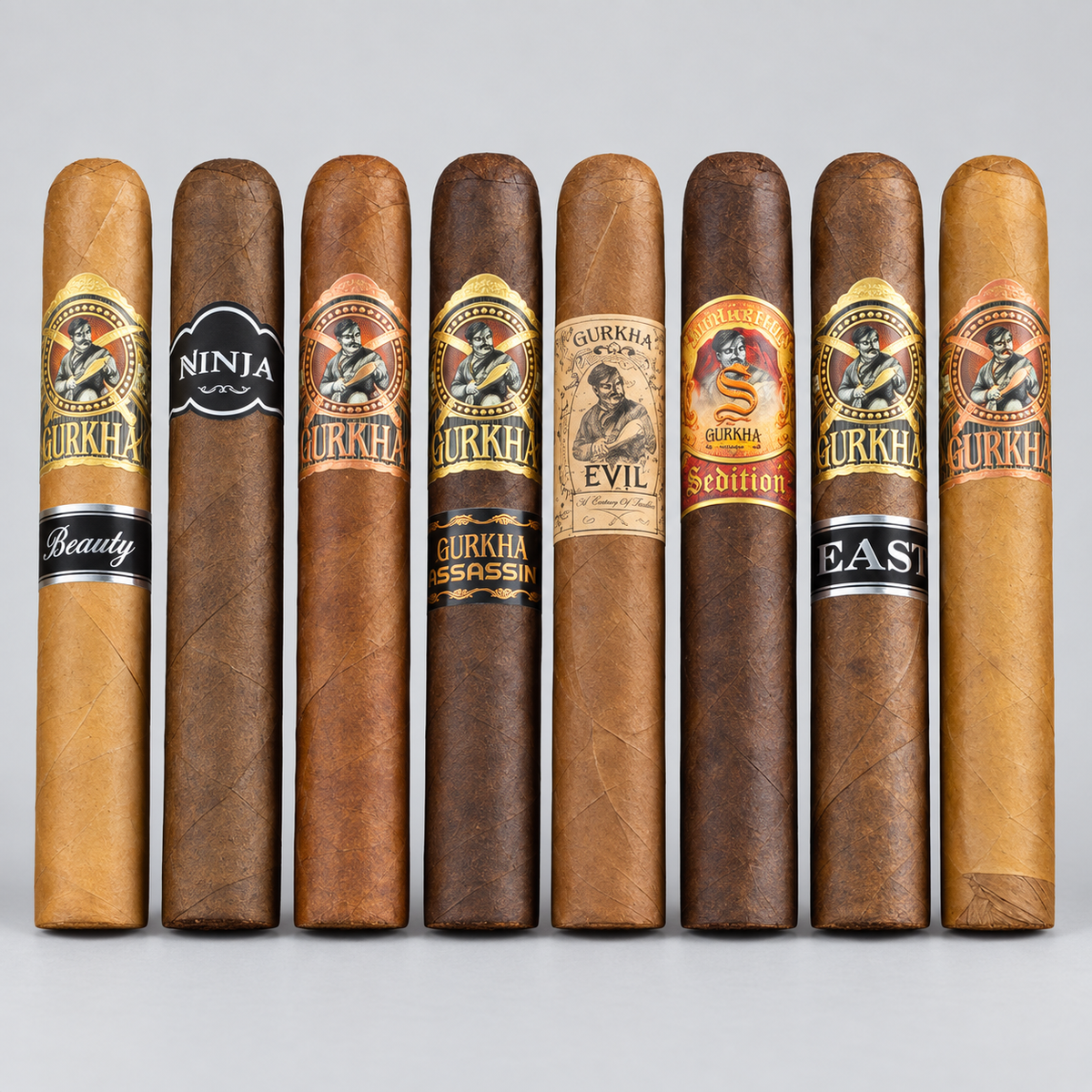Eight cigars arranged upright in a row on a light gray background, each with a different branded label including Gurkha, Nikka, and others.