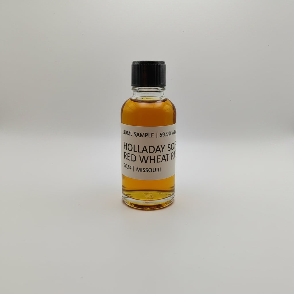 Small bottle of Holladay Red Wheat Whiskey on a white background