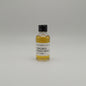 Small bottle of Hakushu Single Malt whisky sample on a gray background