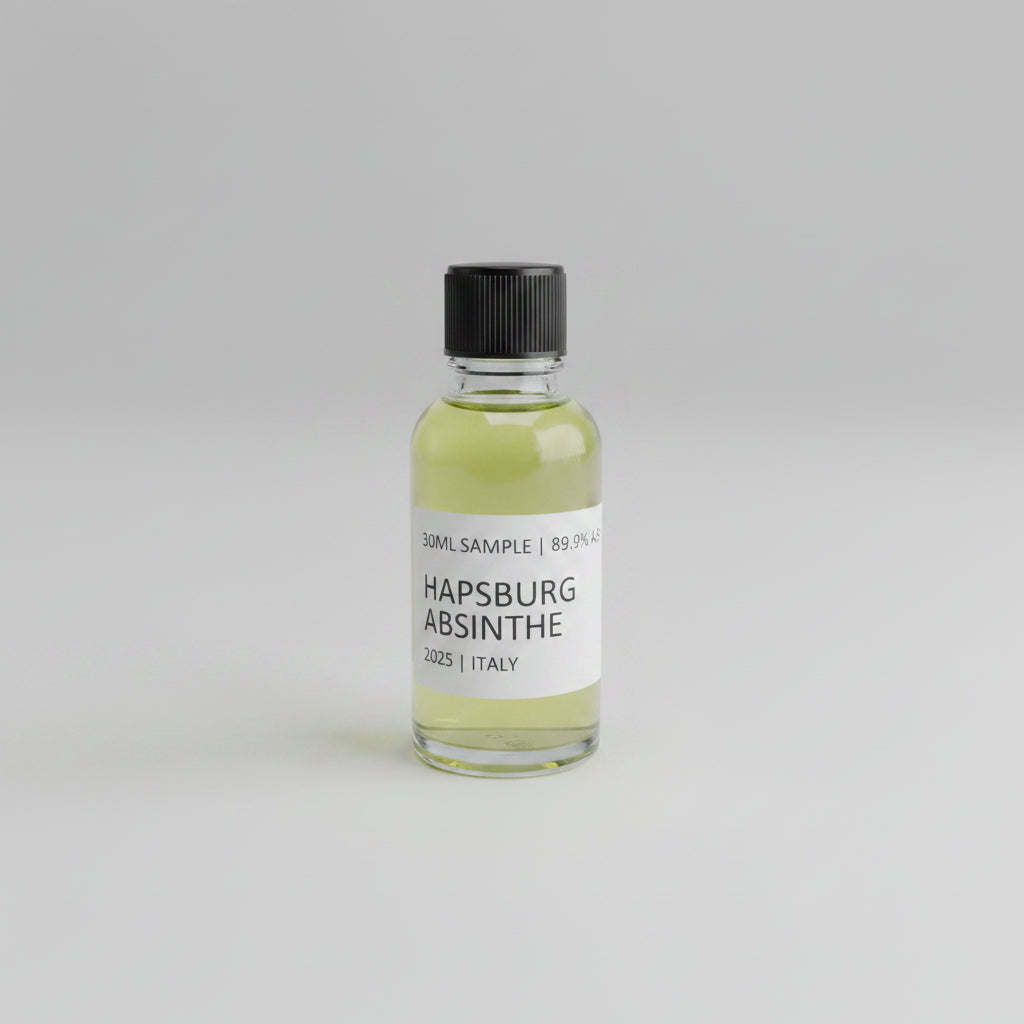 Bottle of Hapsburg Absinthe on a marble surface with arcade games in the background