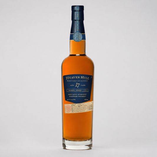 A bottle of Heaven Hill Kentucky Straight Bourbon Whiskey, 17 Years, with amber liquid, a dark blue label, and a dark blue cap, set against a light gray background.