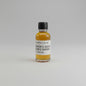 Small bottle of Heaven's door double barrel whiskey on a white background