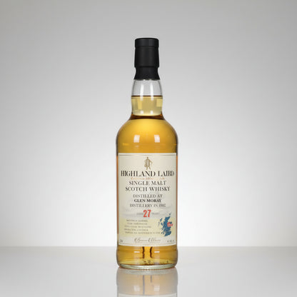 A bottle of Highland Laird Single Malt Scotch Whisky, 27 Years Old, showing the golden whisky inside, with a cream-colored label and a black cap, set against a plain white background.