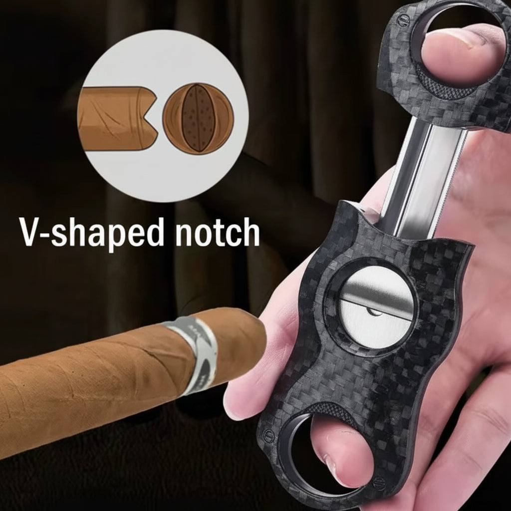 Cigar cutter with a V-shaped notch feature being used on a cigar.