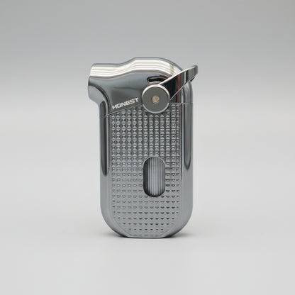 A metallic blue and silver Rocket brand lighter with a textured grip, placed on a wooden surface.