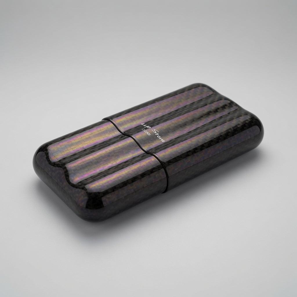 A rectangular carbon fiber lighter with a glossy finish and a black band around the center, featuring a small white logo that reads 'KIMONO'.