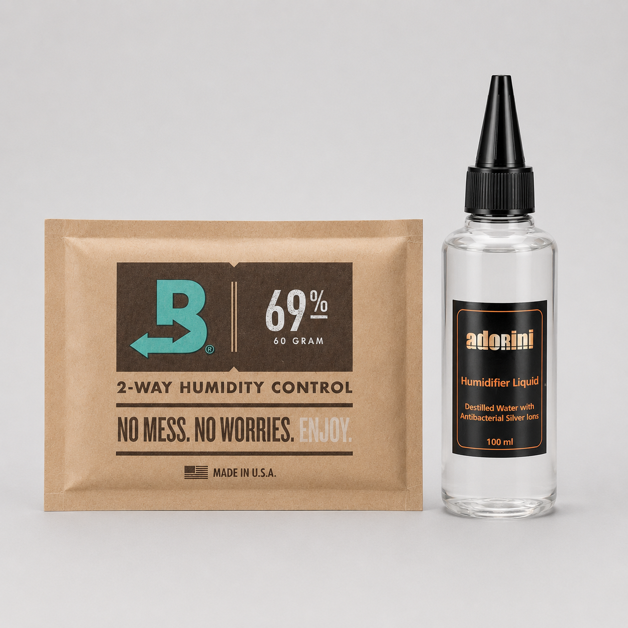 A 60g packet of Boveda 69% RH 2-way humidity control next to a 150ml bottle of adonini Humidifier Liquid on a light gray background.