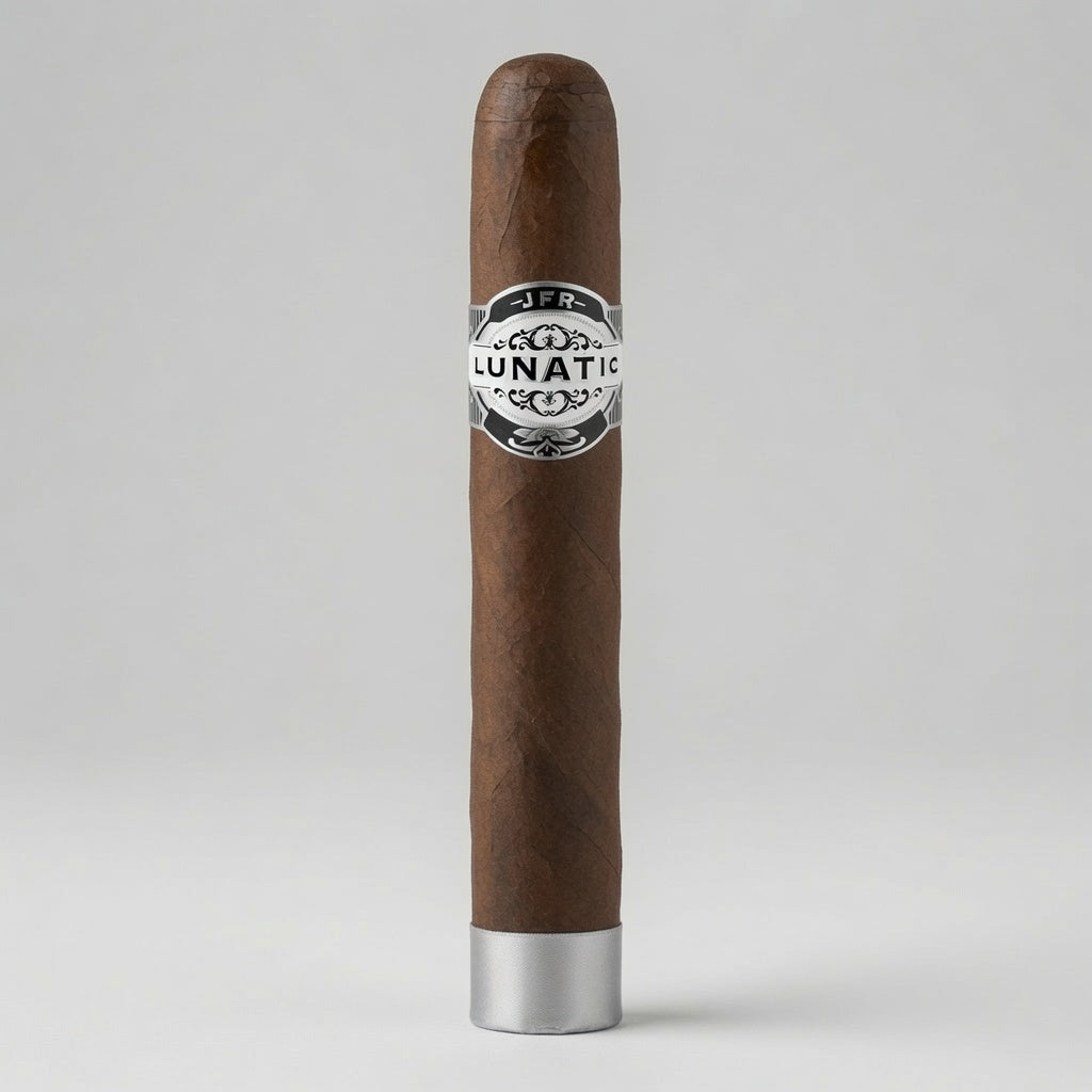 A single brown cigar standing upright on a light gray background, featuring a silver and black 'LUNATIC' band around the center and a silver metal tip at the bottom.