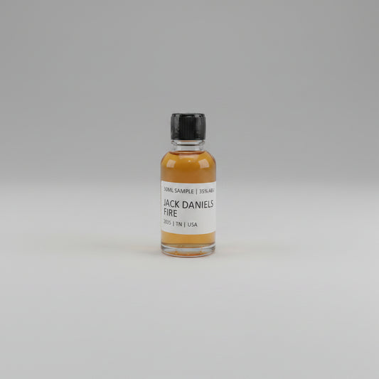 Small bottle of Jack Daniel's Fire on a beige background