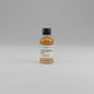 Small bottle of Jack Daniel's Fire on a beige background