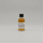 Small bottle of James E. Pepper 1776 Rye Whiskey on a white background