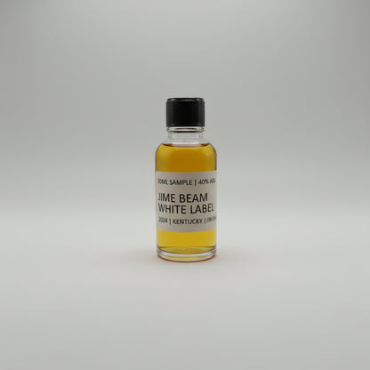 Small bottle of Jim Beam White Label bourbon on a white background