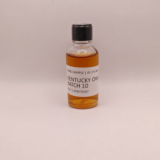 Bottle of Kentucky Owl Batch 10 on a beige background