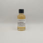 Bottle of Killerran Heavily Peated whisky sample on a light gray background