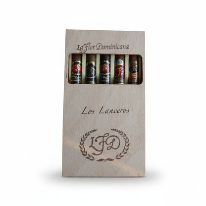 Pack of La Flor Dominicana Los Lanceros cigars in a wooden box on a white background