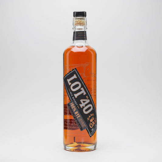 A bottle of Lot 40 Dark Rye 100% Rye Whiskey, showing the amber liquid inside a clear glass bottle with a black and orange label.