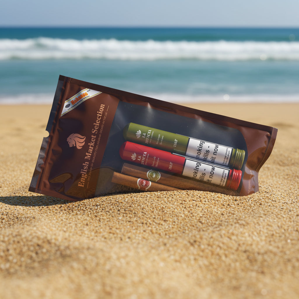 A packaged set of smoking accessories on a white marble-like surface, including a brown pouch labeled 'English Market Selection' with three rolling papers tubes in green, red, and white, and four brown cigars inside.