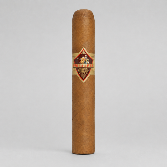 A single brown cigar standing upright against a light gray background, featuring a decorative band with the brand name 'PRINCIPES' and a gold emblem.