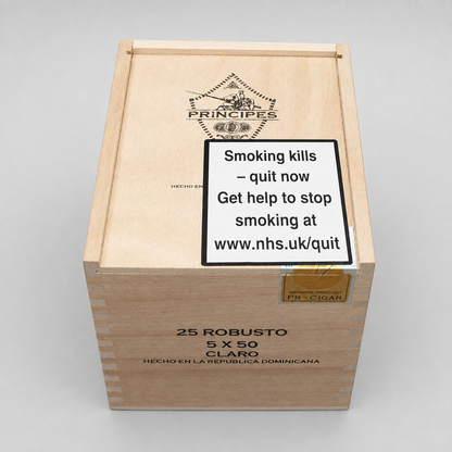 A wooden cigar box labeled PRINCIPES 25 ROBUSTO 5 X 50 CLARO, with a prominent warning sign on the lid and a gold seal, photographed on a light gray background.