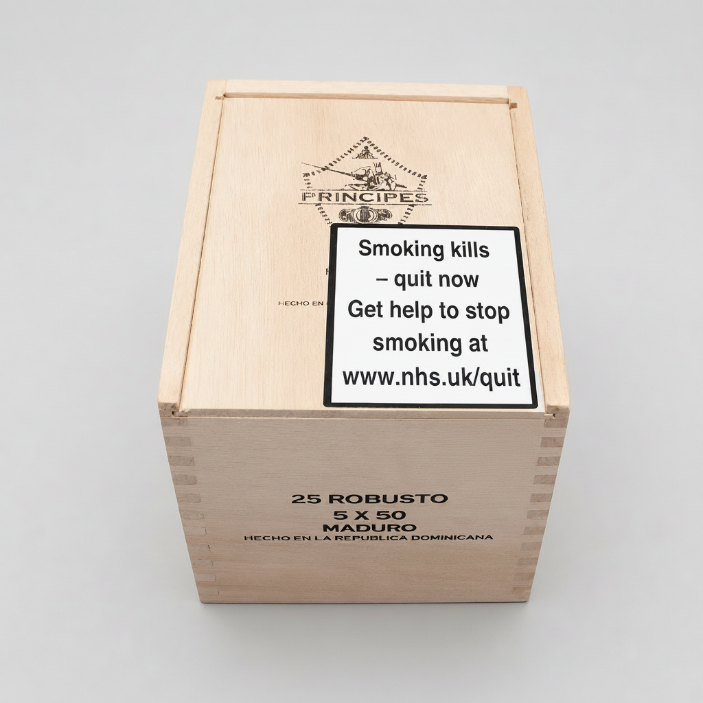 A wooden cigar box with a large warning label on the lid reading 'Smoking kills - quit now Get help to stop smoking at www.nhs.