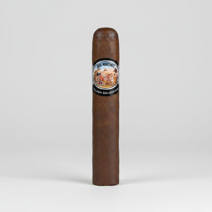 A single dark brown cigar with a circular 'The Martinez' band, shown vertically against a plain white background.