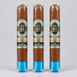 Three cigars in clear plastic wrapping with blue and gold labels reading 'LA IMPERIOSA' and a blue band at the base, shown against a light gray background.