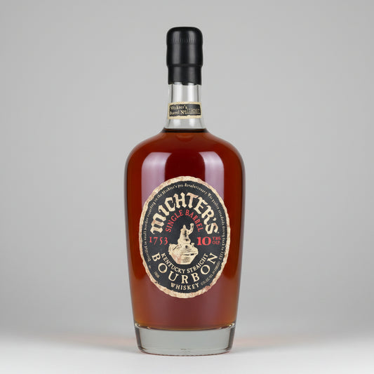 Bottle of Michter's 10-year-old Kentucky Straight Bourbon Whiskey on a dark background