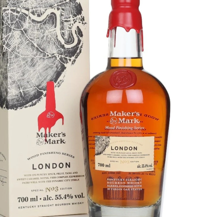 Maker's Mark bourbon bottle and packaging on a white background